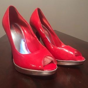 Red pumps with silver heel detail